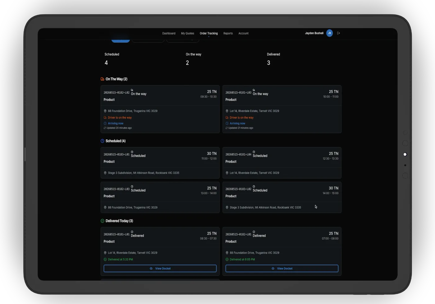 NXT Control order tracking showing loads grouped by on the way, scheduled and delivered, each with site address, time window and a view docket button