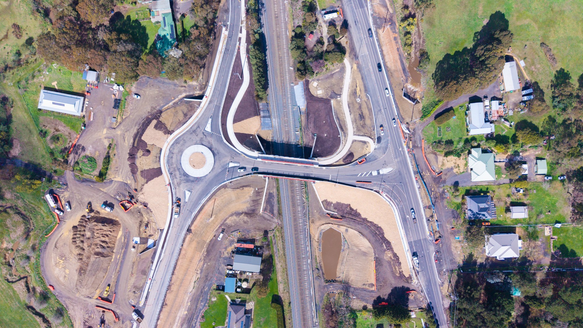 Aerial view of the Wandong interchange on the Inland Rail corridor, the new road bridge crossing the rail line